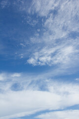 Blue sky and white puffy clouds.