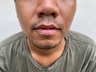 Obraz premium close up unsaved mustache and beard