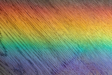 A rainbow on a wooden surface. Rainbow. Wood. Background and wallpaper