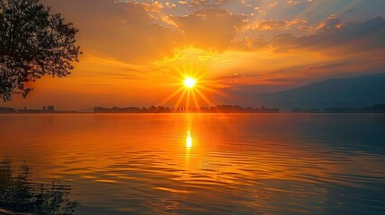 Naklejka premium Glowing sunburst over tranquil lake