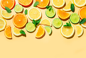 Citrus fruit slices, orange, lemon, lime.