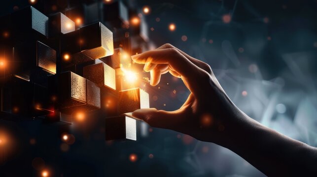 A businessman's hand touching a cube is a symbol of problem-solving