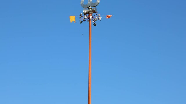 hindu god lord shiva holy trident with bright blue sky at morning video is taken at shipra river ujjain madhya pradesh india.