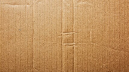 Fototapeta premium Brown cardboard paper of carton corrugated texture. Cardboard box background, Pattern rough carton