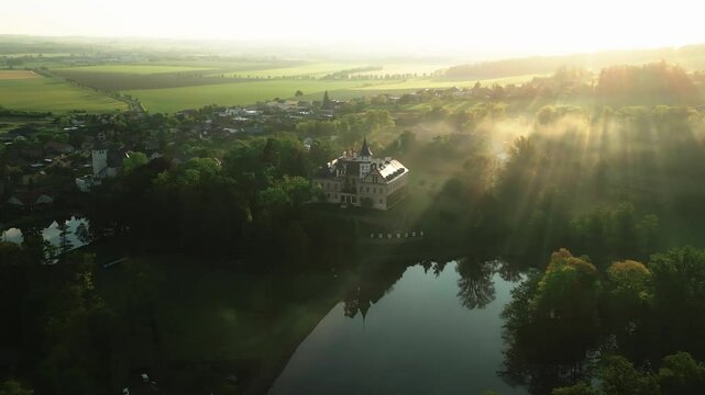 Aerial view of the landscape around Radun Castle in the Czech Republic at dawn