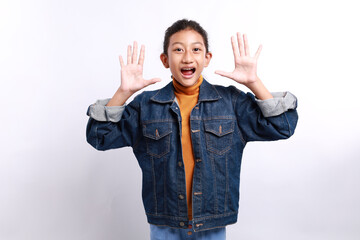 Casual style little girl screaming while raising hand isolated on white background