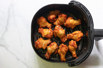Tasty roasted chicken wings. Delicious and easy meals from air fryer.