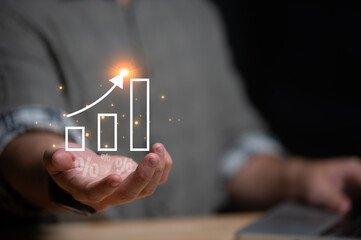 New year business goals and positive indicators, businessman analyzing economic trend data for long-term investment. Development to success and motivation.