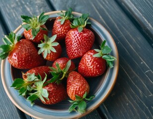 Juicy, ripe strawberry close-up. Panorama, Copy space. Wooden background. Strawberry harvest.