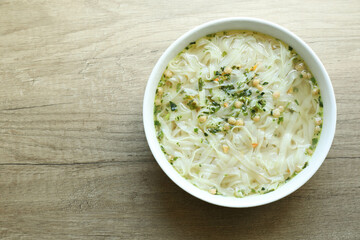 Cooked instant noodles in white bowl