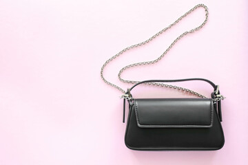 Black leather handbag with chain