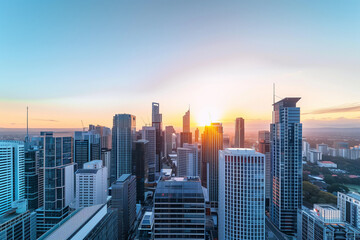Naklejka premium Sunset Backlight Shining Through CBD Skyscrapers