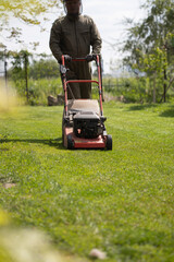 Lawn mover on green grass. Machine for cutting lawns.