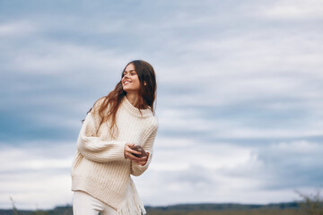 Mountain Woman: A Smiling Adventurous Traveler Capturing Selfie with Smartphone in Cyberspace