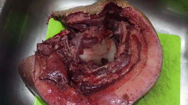 A big piece of fresh raw pork meat, with good amount of fat and skin.