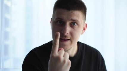 An angry man speaks impulsively.
Emotions of an angry person.
The man is very angry and incensed about something.
Angry and aggressive facial expressions