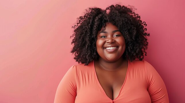 studio portrait of confident overweight happy black woman embodying body positivity and a positive attitude