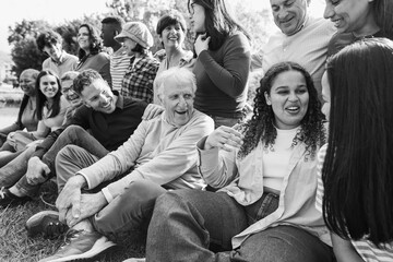 Group of multigenerational people having fun together - Multiracial friends of different ages...