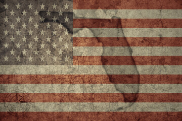 map of florida state and flag of united states of america on a old vintage crack paper background .