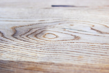 A detailed view of a wooden surface showing its grain pattern
