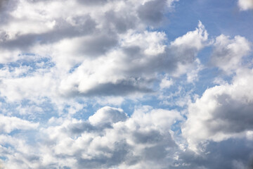 Fototapeta premium Blue sky background. The clouds on the sky. Colorful blue sky view in bright tones.