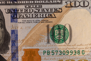 a close-up of a hundred US dollars of a new sample