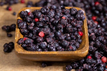 various blueberries after freezing are on the table