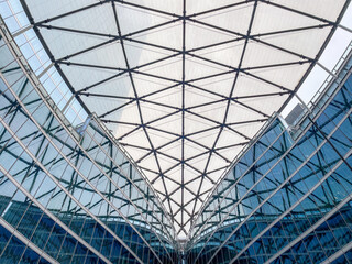 Fototapeta premium Contemporary modern glass building with curved walls and ceiling, view from inside