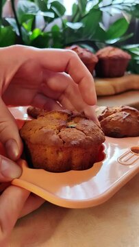 Vertical, mobile video with a delicious,beautiful airy cupcake close-up