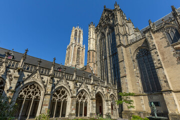 Fototapeta premium Pandhof in the historic medieval city of Utrecht in the Netherlands. With a view of the St. Martin's Cathedral and Dom Tower of Utrecht Netherlands