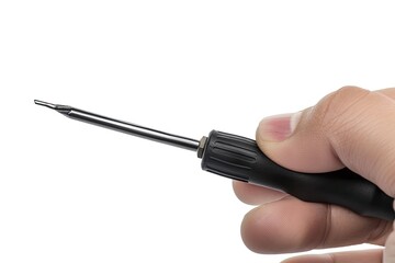 Hand holding a Phillips head screwdriver