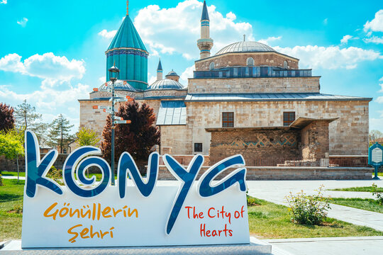 Mevlana Tomb and Mosque in Konya. View of the Mevlana Museum with the Konya inscription in front of it. Mevlana Celaleddin-i Rumi. Konya, Turkey.