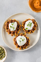 Vegetarian sweet potato waffles with natural yogurt. Healthy breakfast.