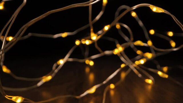 Copper Wire String Lights On A Wooden Surface