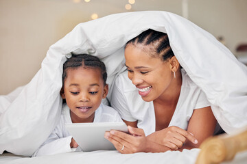 Black family, blanket and tablet to relax in home, online and security in relationship or love. Mother, daughter and duvet for fort or watching cartoon in bedroom, streaming and rest together in bed