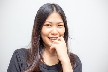 Beautiful happy asian women portrait smiling wearing black shirt