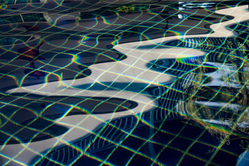 The water is reflecting the sky and the sky is reflected in the water