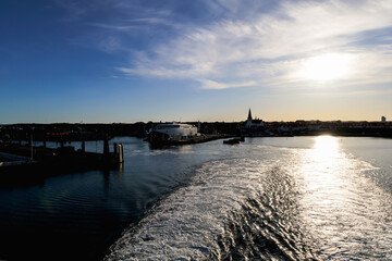 Obraz premium View of the island of Bornholm from the sea in the evening. Bornholm, Denmark 