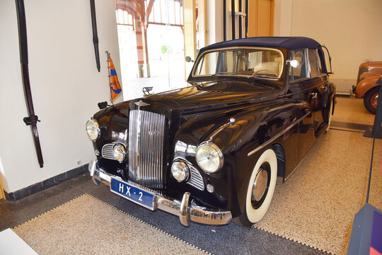 Apeldoorn, the Netherlands. June 23, 2024. Old cars and carriages in the stables Palace Het Loo