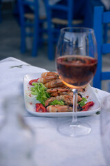 Glass of rose wine in the restaurant 