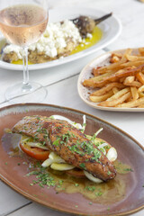 Various Mediterranean dishes served on the restaurant table	