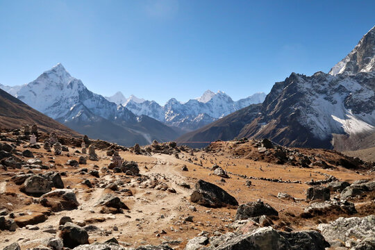 View onto the Everest Memorial Chukpi Lhara in front of Mount Amphu Gyabjen, Ama Dablam, Kangtega and Thamserku, Mount Everest Base Camp Trek, EBC, Nepal