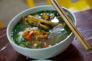 Delicious Chicken soup noodles with fresh chili slices