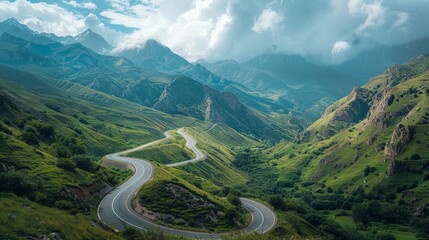 A scenic mountain pass, winding road through rugged terrain and breathtaking vistas