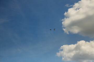 clouds, planes, exercises. Huge clouds and small planes