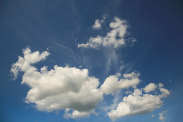 High cloudiness. Overcast weather. Clouds over a green field. Beautiful background