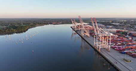 Discover captivating visuals of Southampton Container Port, showcasing bustling activity, impressive cranes, and vibrant shipping containers in this renowned maritime hub. 