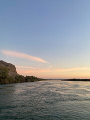 Obraz premium sunset over the river