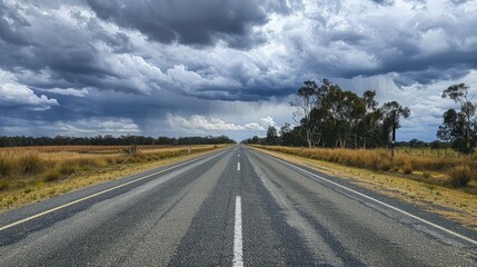 Naklejka premium The straight stretch of Matilda Highway under overcast skies in Queensland