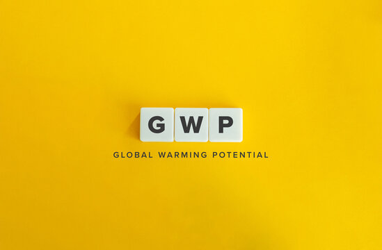 Global Warming Potential, GWP. Block Letter Tiles on Flat Background. Minimalist Aesthetics.